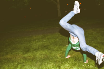 Man standing on grassy field