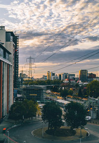 View of city against cloudy sky