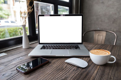 Coffee cup on table