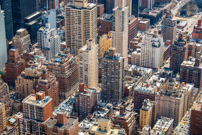 High angle view of modern buildings in city