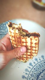 Close-up of woman holding ice cream