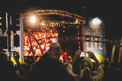 Rear view of crowd at music concert