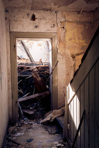 Damaged window in abandoned house