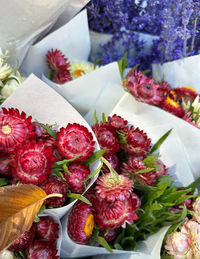 Close-up of paper wrapped flowers at farmers market