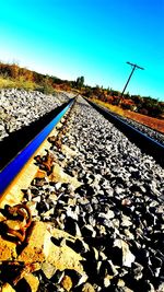 Railroad tracks against clear sky