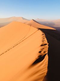 Scenic view of desert against sky