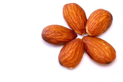 Close-up of fruits against white background