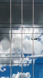 Reflection of sky on glass window