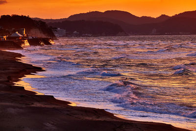 Scenic view of sea against sky during sunset