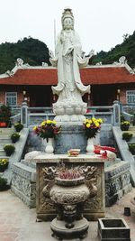 Statue of fountain outside temple
