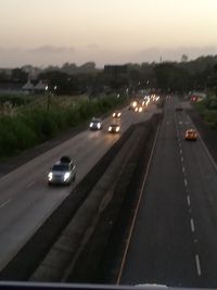 Cars on road against sky