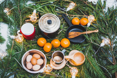 High angle view of orange fruits in container