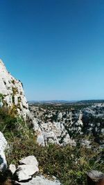 Scenic view of sea against clear blue sky