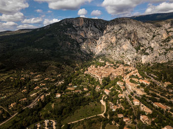 High angle view of typical french village in the mountains against sky