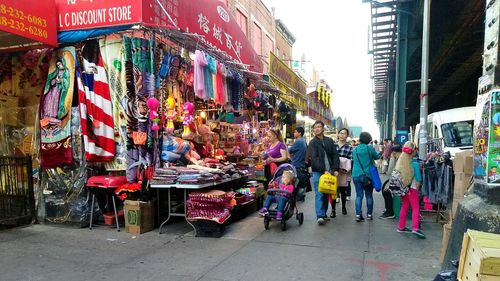 People walking on street in city