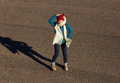 Full length of girl standing on street
