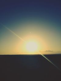 Scenic view of silhouette landscape against sky during sunset