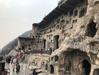 Group of people in front of historical building