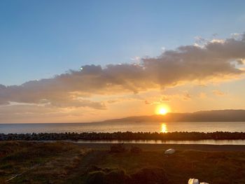 Scenic view of sea against sky during sunset