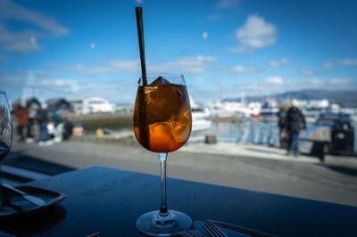 Close-up of aperol drink on table