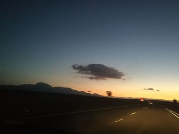 Road against sky during sunset