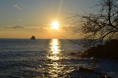 Scenic view of sea at sunset