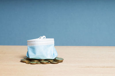 Close-up of bread on table against blue background