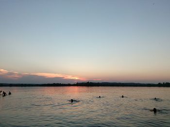 Scenic view of calm sea against sky during sunset