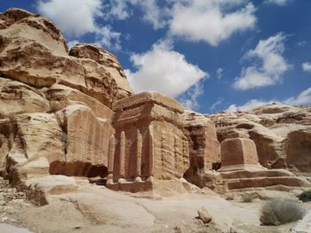 Low angle view of old ruins at petra against sky