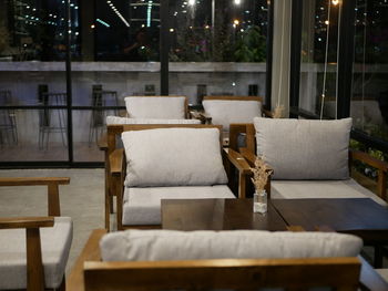 Empty chairs and table in cafe