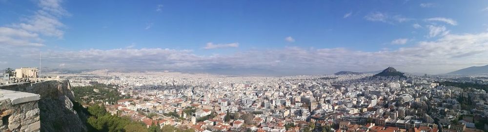 High angle view of townscape against cloudy sky