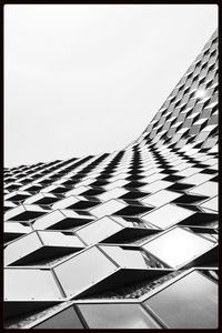 Low angle view of modern building against clear sky