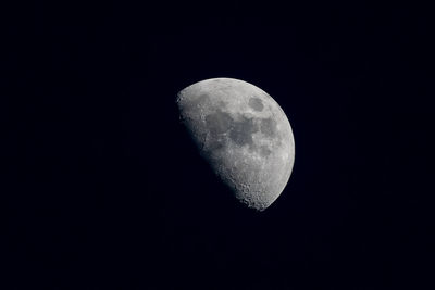 Low angle view of moon against sky at night