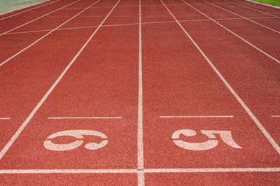 High angle view of numbers on running track