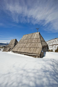 High angle view of house against sky during winter