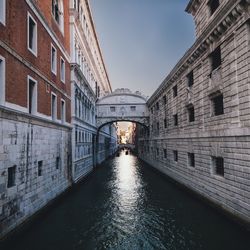 View of canal along buildings