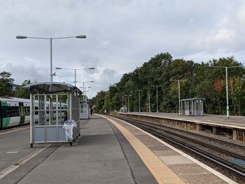 Railroad station platform against sky