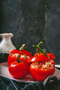 Close-up of red chili peppers on table