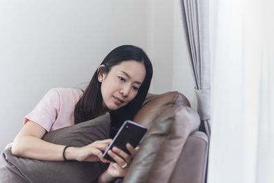 Woman using mobile phone