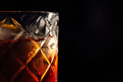 Close-up of drink against black background