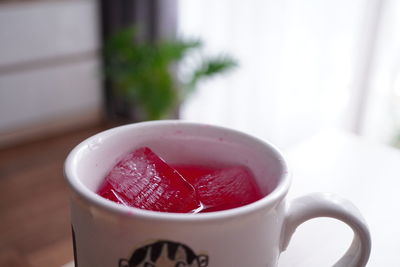 Close-up of coffee in cup on table