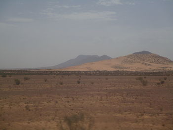 Scenic view of desert against sky