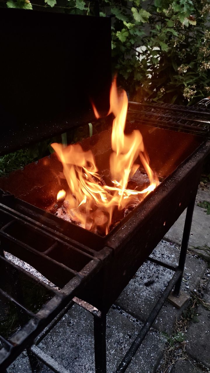 fire, burning, flame, heat, nature, wood, meat, no people, log, glowing, firewood, barbecue grill, barbecue, outdoors, campfire, high angle view, day, tree, grilling, orange color, fireplace, front or back yard, food and drink, outdoor grill, fire pit