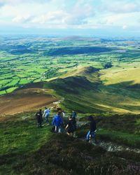 Rear view of man standing on field