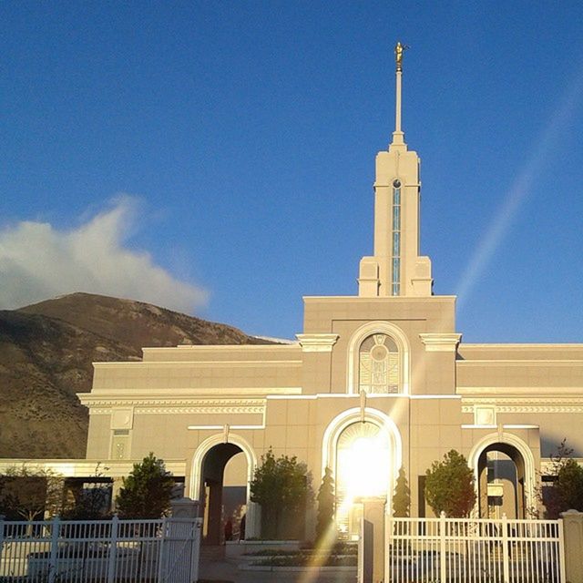 architecture, built structure, building exterior, low angle view, arch, blue, clear sky, sky, place of worship, church, sunlight, religion, famous place, tower, travel destinations, spirituality, dome, day, travel