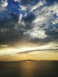 Scenic view of dramatic sky over landscape