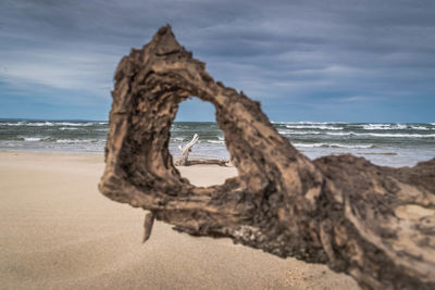 Scenic view of beach against sky
