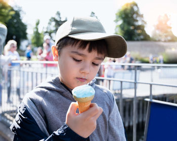 Portrait of boy holding ice cream