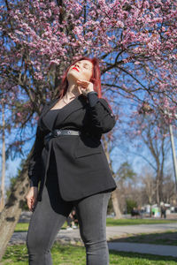 Full length of woman standing on field