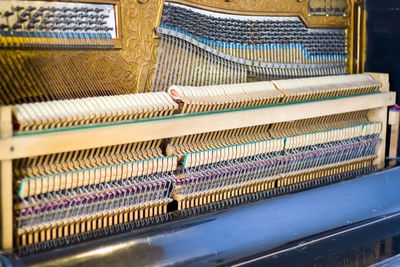 Piano instrument inside, antiquary piano and old mechanism, close-up